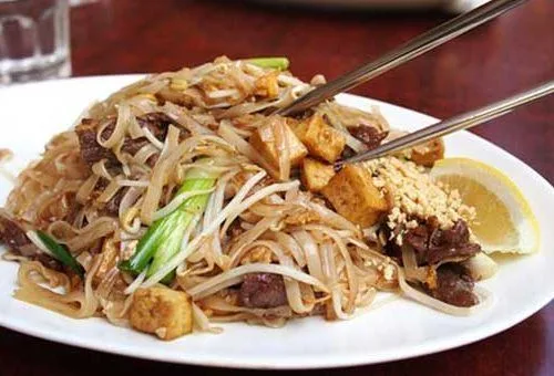 Close-up of a Chai-Yo dish served with chopsticks