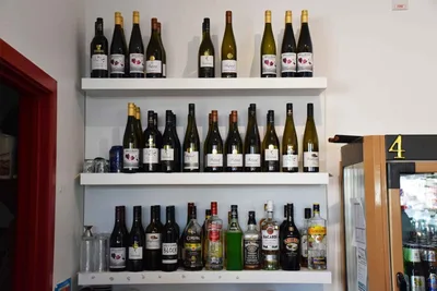 Shelf of wine and spirit bottles