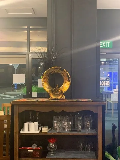 Shelf with glassware and a vase